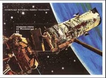 Colnect-5668-542-Space-shuttle-Discovery-astronaut-space-walking.jpg