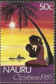Colnect-1205-046-Woman-with-Children-at-the-Beach.jpg