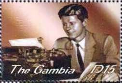 Colnect-4725-244-John-F-Kennedy-at-typewriter.jpg