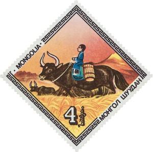Colnect-6004-982-Yak-Bos-mutus-with-Rider.jpg