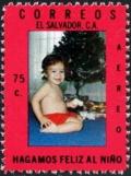 Colnect-3529-190-Child-and-Christmas-Tree.jpg