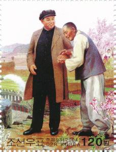 Colnect-3276-468-Kim-Il-Sung-and-Farmers.jpg