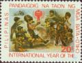 Colnect-2918-118-Children-playing-and-IYC-emblem-diff.jpg
