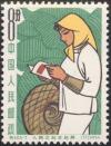 Colnect-951-542-Woman-reading-book.jpg