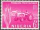 Colnect-430-667-Tractor-and-corn.jpg