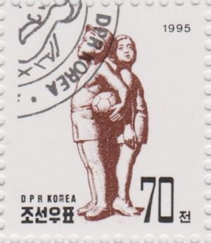 Colnect-1431-243-Boy-and-girl-comparing-heights.jpg